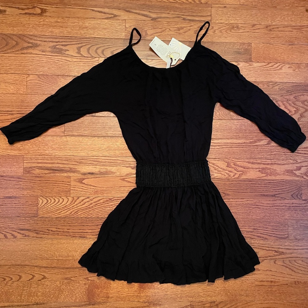 NWT Boutique Brand Elan black dress. Women’s size small.